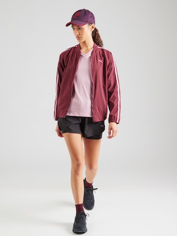 T-shirt fonctionnel 'TAD ESSENTIAL' PUMA en rose