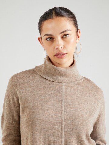 Claire - Jersey 'Puk' en beige