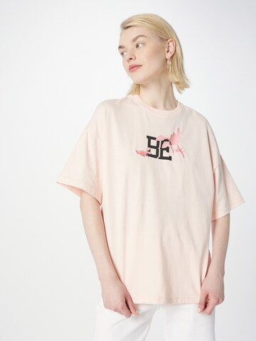 UNITED COLORS OF BENETTON T-Shirt in Rosa, Hellpink | ABOUT YOU