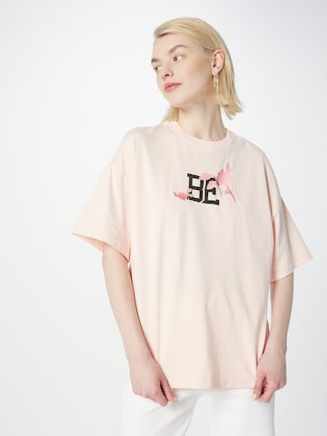 UNITED COLORS OF BENETTON T-Shirt in Rosa, Hellpink | ABOUT YOU