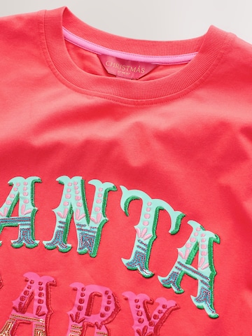 Next - Camiseta 'Christmas Santa Baby' en rojo