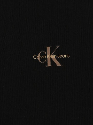 Calvin Klein Jeans Plus قميص بلون أسود