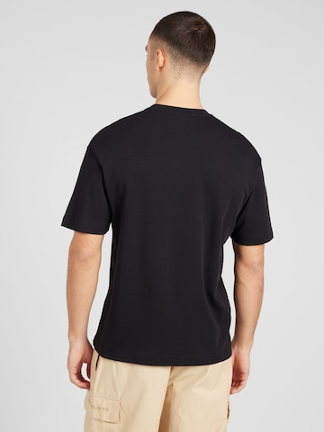 Calvin Klein Bluser & t-shirts i sort