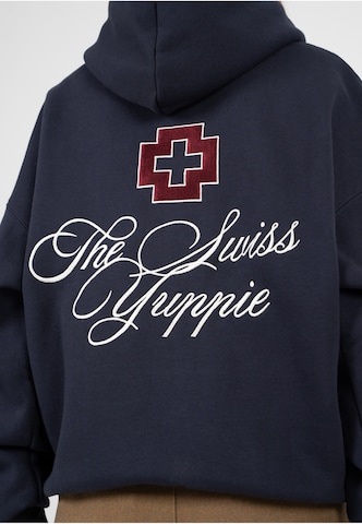 Prohibited Mikina 'The Swiss Yuppie' – modrá