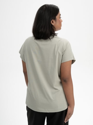 MELA - Camiseta ' MADHU ' en verde