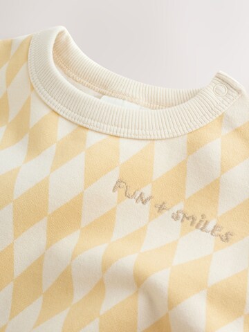 Next Strampler in Gelb