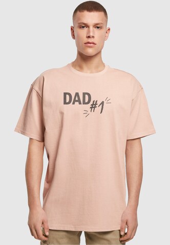 Maglietta 'Fathers Day - Dad number 1' di Merchcode in arancione: frontale