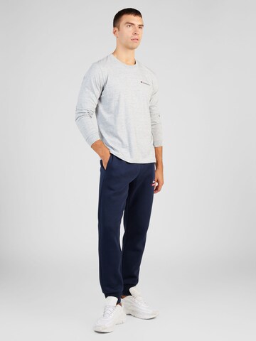 Tapered Pantaloni de la Champion Authentic Athletic Apparel pe albastru