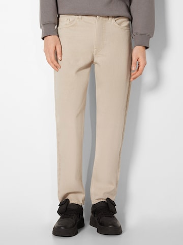 Bershka Regular Jeans in Beige: front