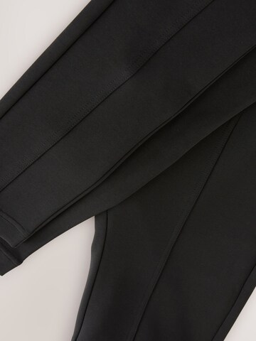 Next Skinny Legginsy w kolorze czarny