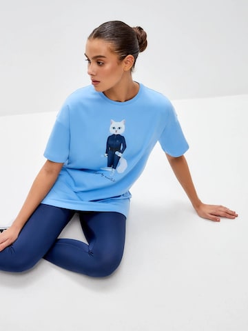 Cat e Lolette Shirts 'Sport cat with dumbbells' i blå
