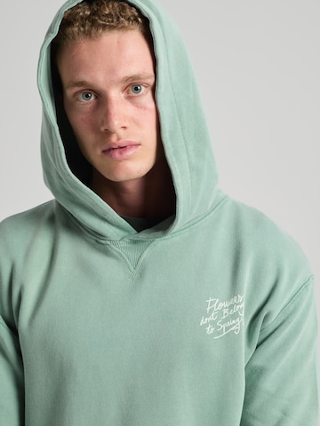 Trendsplant Bluzka sportowa 'FLOWERS' w kolorze zielony: przód