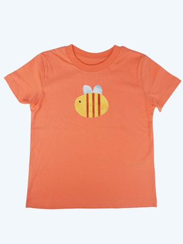 T-Shirt 'Hummel' MelaDi en orange : devant