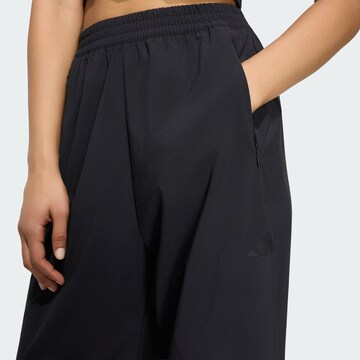 ADIDAS SPORTSWEAR - Pierna ancha Pantalón deportivo en negro