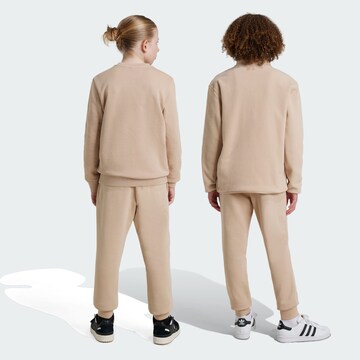 ADIDAS ORIGINALS Tapered Trousers 'Trefoil Essentials' in Beige