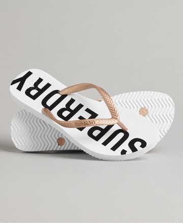 Superdry T-Bar Sandals in Gold