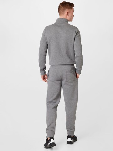 Superdry Tapered Housut värissä harmaa