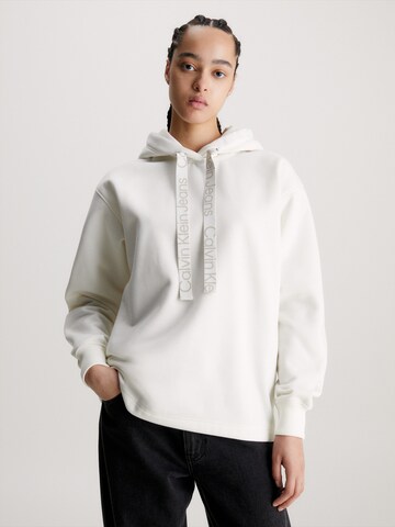 Sweat-shirt Calvin Klein Jeans en blanc : devant