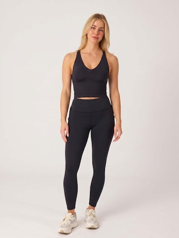 SNOCKS Bralette Sports Bra in Black: front