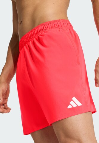 ADIDAS SPORTSWEAR Board Shorts in Red