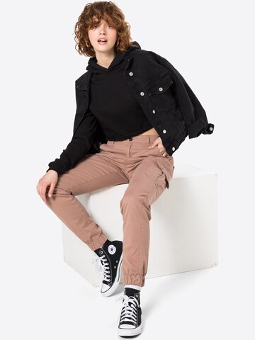 Effilé Pantalon cargo Urban Classics en beige