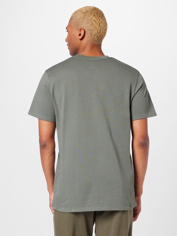 T-Shirt fonctionnel UNDER ARMOUR en vert