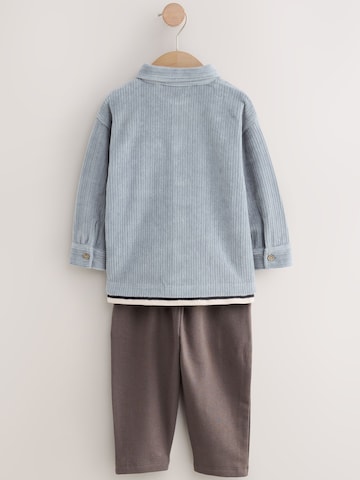 Set Next en bleu