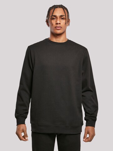 Sweat-shirt 'Escape Discover the World Town Train Station' F4NT4STIC en noir : devant