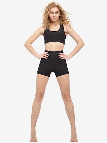 Winshape Skinny Sportovní kalhoty 'HWL512C' – černá