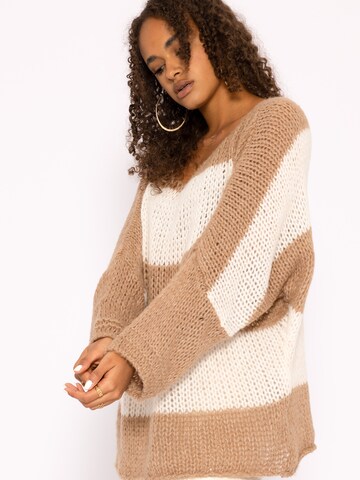 SASSYCLASSY Sweter oversize w kolorze brązowy