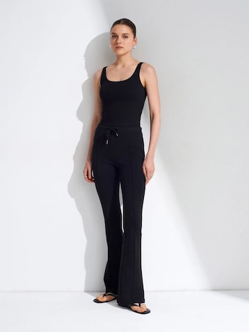 Top di Dilvin in nero