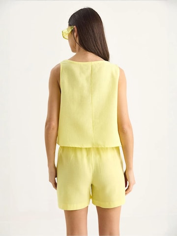 Pantalons de tailleur Bianco Lucci en jaune