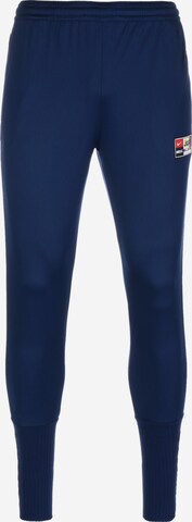 Effilé Pantalon de sport NIKE en bleu : devant