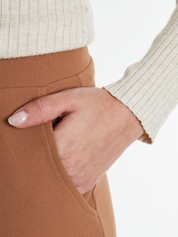 Ana Alcazar Loose fit Trousers with creases in Brown
