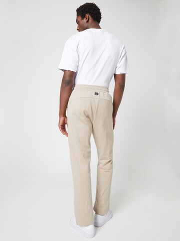 Loosefit Pantalon ABOUT YOU x Louis Darcis en beige