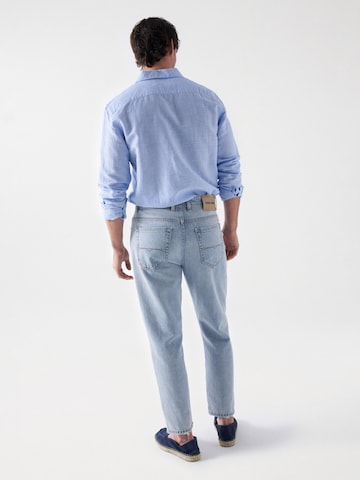 Coupe slim Jean Salsa Jeans en bleu