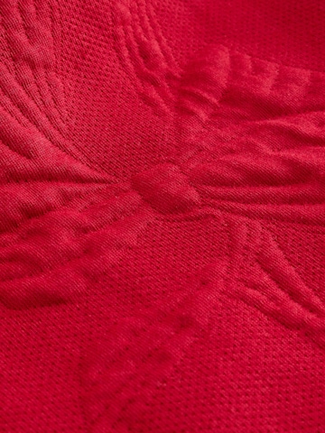 Rochie de la Next pe roșu
