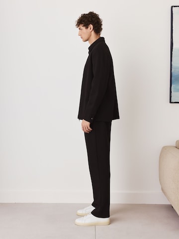 melns Next Standarta Bikses