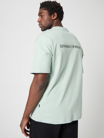 ABOUT YOU x Louis Darcis T-shirt i grön