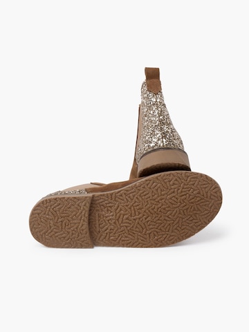 Pisamonas - Botas en marrón