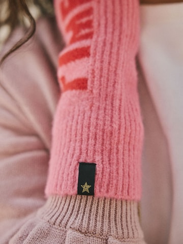 Scaldapolsi di Rockett St George in rosa