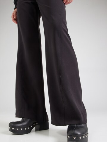 Calvin Klein Široke hlačnice Hlače | črna barva