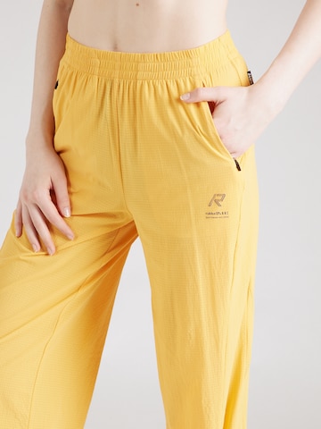Effilé Pantalon de sport 'MURTO' Rukka en jaune