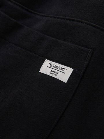Ombre - regular Pantalón deportivo en negro