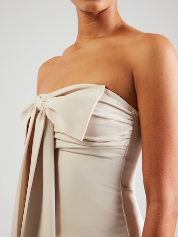 Haut millane en beige