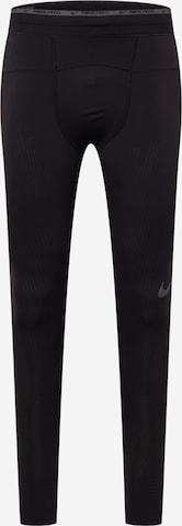 NIKE - Skinny Pantalón deportivo en negro: frente