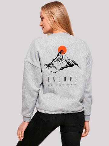 F4NT4STIC Sweatshirt 'Escape Discover the World Mountain' in Grijs