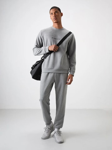 Tommy Life Jogginganzug in Grau
