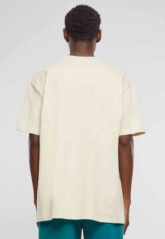 T-Shirt 'Greatest' MT Upscale en beige
