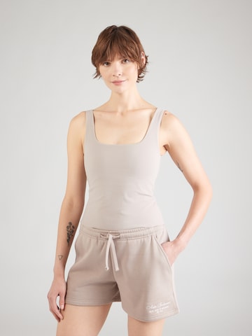 Top sportivo 'Sense' di Aim'n in beige: frontale